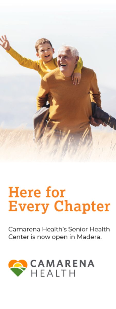 An older man carrying a smiling young boy on his back in a field, both wearing yellow, with text reading Here for Every Chapter. Camarena Health’s Senior Health Center is now open in Madera. Camarena Health logo below.
